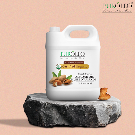 Puroleo certified organic almond oil container on a stone platform with a peach background